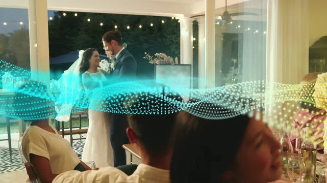 Entering sliding doors, bride and groom dancing toward guests, celebrating wedding under lights