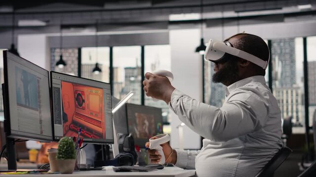 Black game developer designing assets with VR headset at the office, working on spatial video game in space. Engineer uses modeling tools on animation software, creating futuristic virtual world.