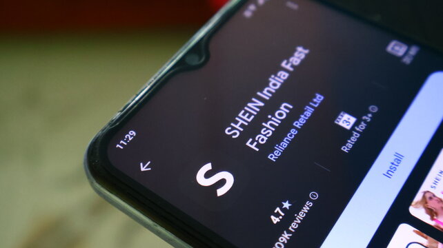 A smartphone screen displaying the SHEIN India Fashion app for download
