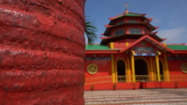 Editorial: BATAM, INDONESIA - APRIL 22, 2026: Slow motion footage of Muhammad Cheng Hoo Mosque in Batam, featuring its unique Chinese-style red architecture and serene atmosphere.