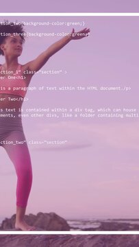 Vertical video: Woman reacting to scrolling code, shifting weight, extending arms on rocks for tech