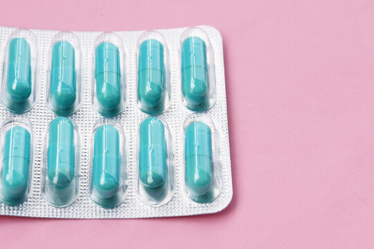 Blue capsules of Doxycycline in blister packs.