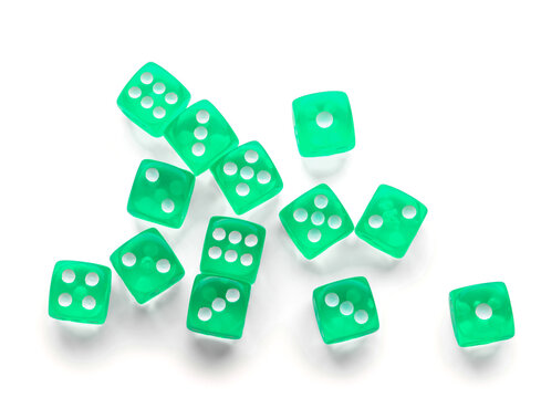 Many green game dices on white background