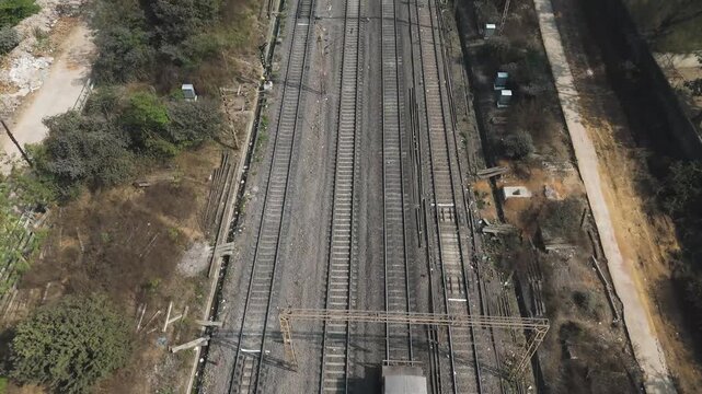Aerial View of Railway Lines, Drone Shot of Train Tracks, Top View of Railway Track Network, Freight Train on Railway Line stock video.