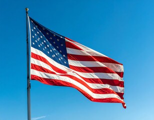 Fototapeta premium The American flag waves in the wind on a clear day outside.