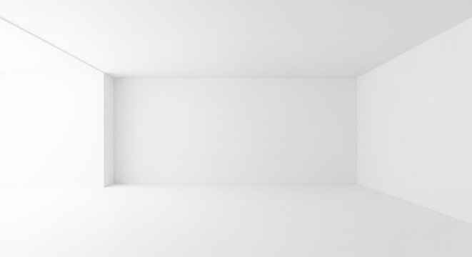 A minimalist white room with a recessed area on the left side of the back wall and a slanted ceiling