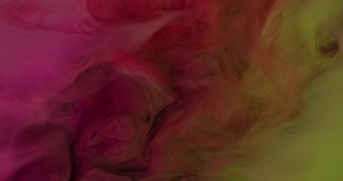 Vapor mix. Paint drop. Defocused yellow purple pink color splash fog cloud texture glitter liquid spreading on abstract bright background.
