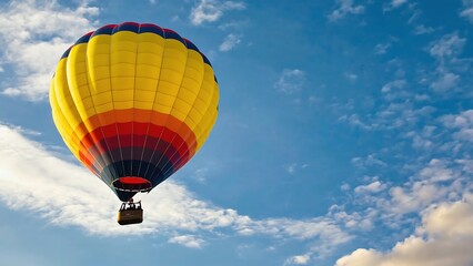 Naklejka premium A vibrant hot air balloon soars through a picturesque sky filled with fluffy clouds, creating a serene and uplifting scene.