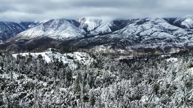 The California San Gorgonio San Bernardino Mountain Range near the Santa  Ana Watershed covered in snow along SR 38 through the Mountain Pass