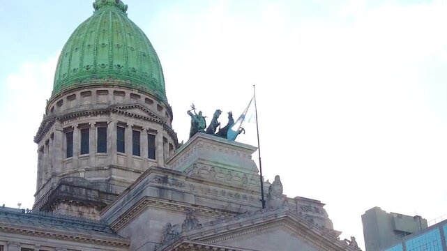 Slow Motion Low Angle of Congress Palace Green Dome and Bronze Quadriga Statue at Sunset