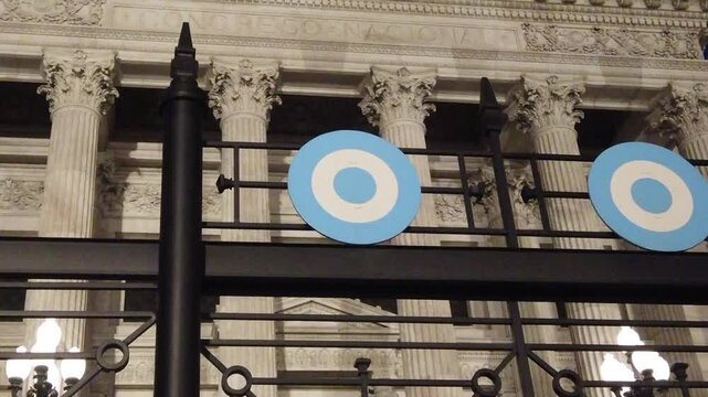 Low Angle Night View of National Congress Palace Facade with Argentine Cockade Symbols