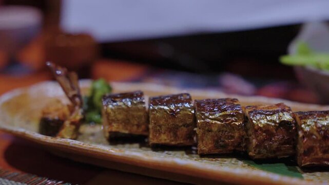 Pacific Saury Served Fried, Wrapped Rice Fish in Japanese Grilled Izakaya Style