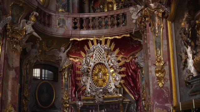 Detailed view of the high altar and twisted columns inside the late Baroque Asam Church, Munich.