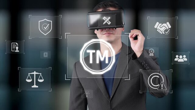 A businessman uses a virtual reality headset while surrounded by digital icons, symbolizing innovation and the importance of intellectual property in today corporate landscape. Raster
