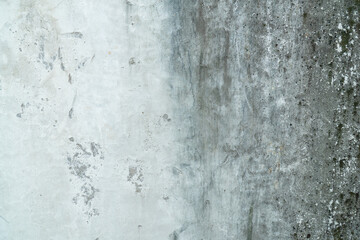 Fototapeta premium Grunge gray wall texture with gradient stains and rough weathered surface, ideal for abstract background, urban decay concept, and copy space design.