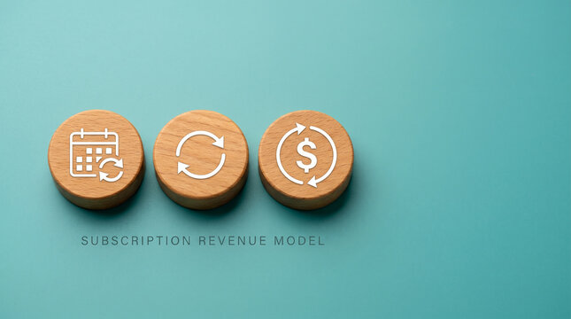 Three natural wood discs with calendar, refresh cycle, and dollar icons on a soft teal background representing subscription and recurring revenue.