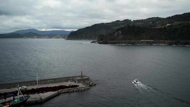 Little boat in Getaria village, Basque Country. High quality 4k drone footage