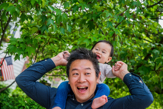 Portrait of father with toddler son