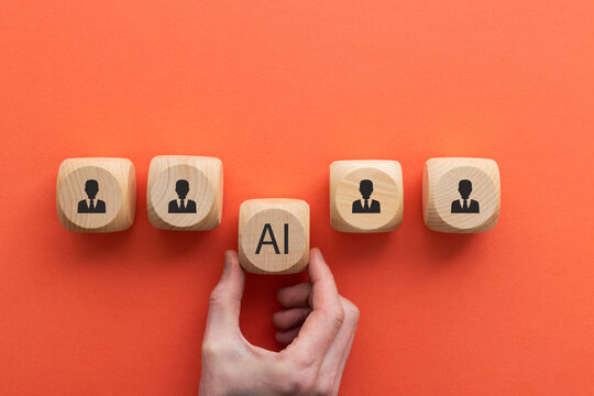 Artificial intelligence transforming human resources. Placing AI wooden blocks among human icons. AI transforming human resources, recruitment automation, workforce transformation, the future of work.