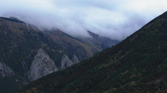 Mountain range in Asturias Spain with dramatic clouds aerial