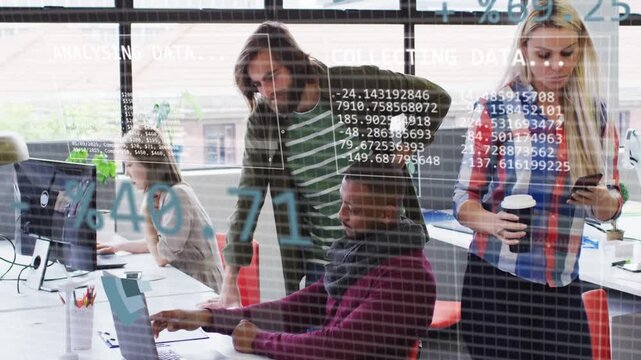 Seated coworker pointing at laptop, leaning man guiding, analytics overlays growing for analysis