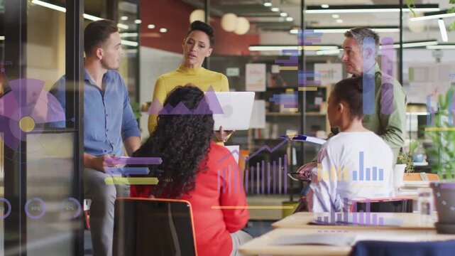 Woman in yellow top presenting laptop activating business charts while team exchanging notes