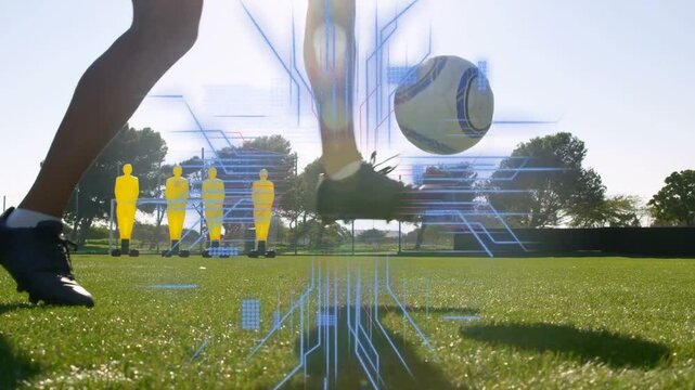 Player planting foot beside ball, initiating data overlay and juggling near dummies during training