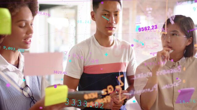Left woman talking and pointing at glass, man holding tablet as animated charts guiding team review