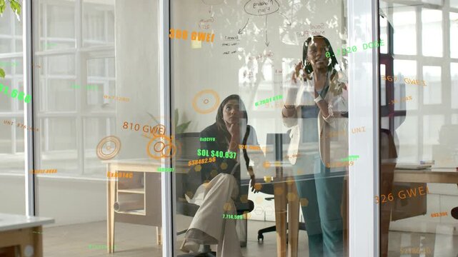 Standing colleague starting by pointing glass, AR overlays showing while both tracing to consensus