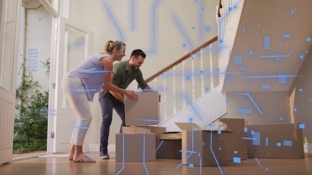 Couple entering placing box onto staging stack while tech overlay animating over pair and boxes