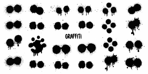 Fototapeta premium Collection of abstract black spray paint splatters and drips on white