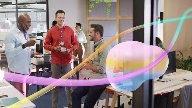 Office team on coffee break coworker gesturing ribbon and 3D blob sweeping past sparking laughter