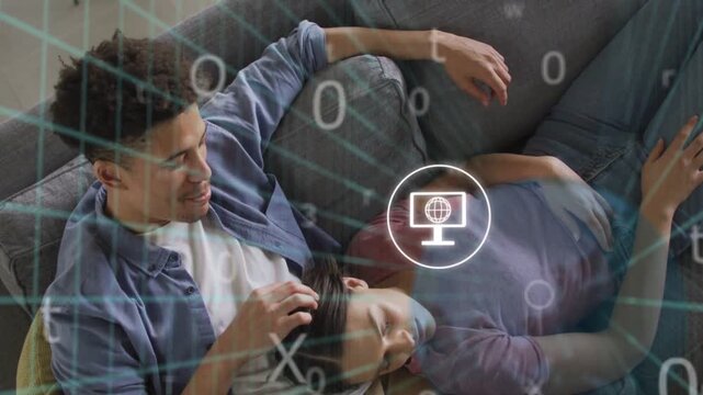 Woman raising phone initiating tech UI icons floating over couch, man stroking hair, opening chat