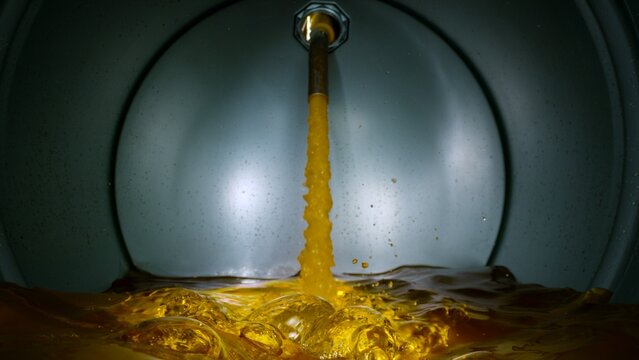 Gasoline Flowing and Splashing inside a Barrel