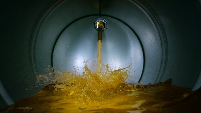 Gasoline Flowing and Splashing inside a Barrel