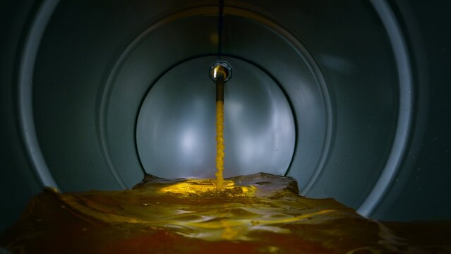 Gasoline Flowing and Splashing inside a Barrel