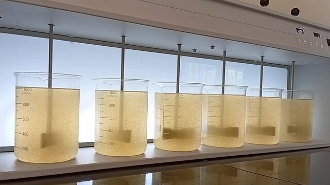 Alternative Side View of Final Slow Mixing Phase at 40 RPM Showing Flocculation Success in Jar Test