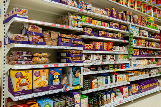 Shelves of gluten, dairy and nut free food on shelves in a Tesco store