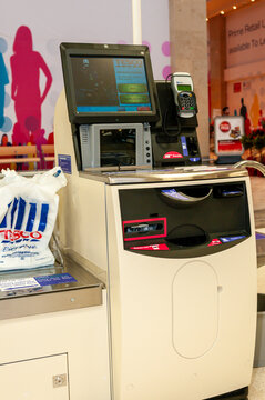 Self-service tills in a Tesco Store