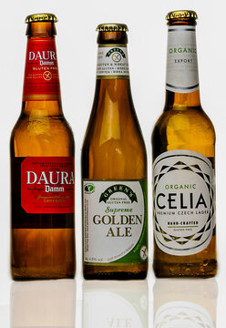 Three bottles of gluten-free beer Damm Daura, Greens Supreme Golden Ale and Celia from the Czech Republic