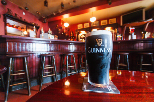Pint of Guinness in a traditional Irish pub