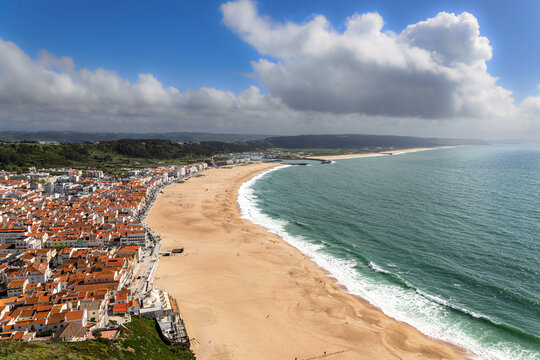 View onto the beach and town of Nazare, Portugal.