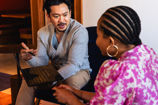 Asian Businessman having a meeting with Coworker at office