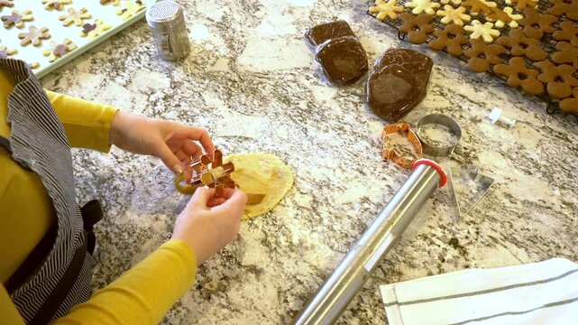 Baking Christmas Gingerbread Cookies in Modern White Kitchen