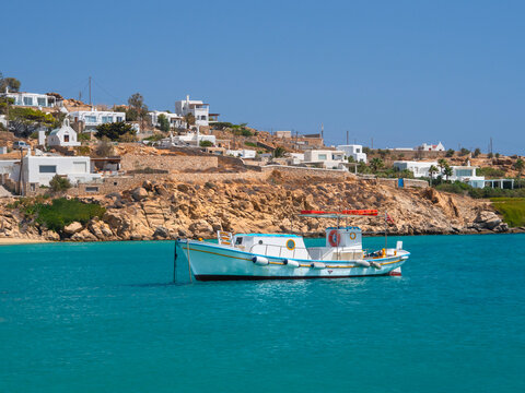 Beautiful fishing boats on Platis Gialos beach on the island of Mykonos in Greece.