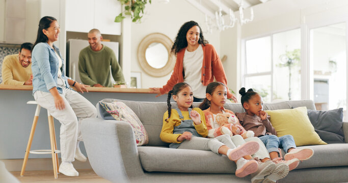 Happy, parents and friends with children on the sofa for watching tv, social hangout and relax. Home, weekend and people with kids on couch for bonding, entertainment and streaming at play date