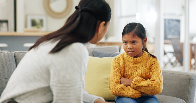 Talking, discipline and mom with girl in home for behavior, tantrum and bad attitude for parenting. Upset, family and mother with child in lecture, discussion or scold for rules, warning and stubborn
