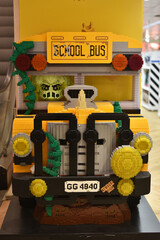 Naklejka premium School bus made of Lego bricks