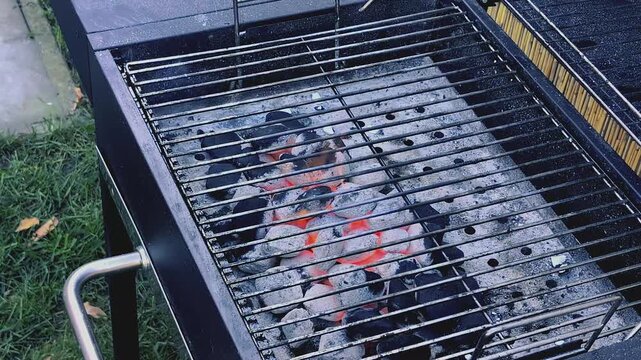 Grill setup for a barbecue in the backyard on a sunny afternoon