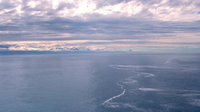 High angle sunrise view over Indian Ocean toward Tsitsikamma Mountains, Robberg